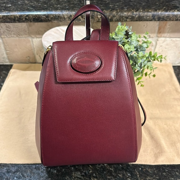 Cartier Handbags - Cartier Turn Lock Leather Vintage Backpack comes with unbranded dustbag